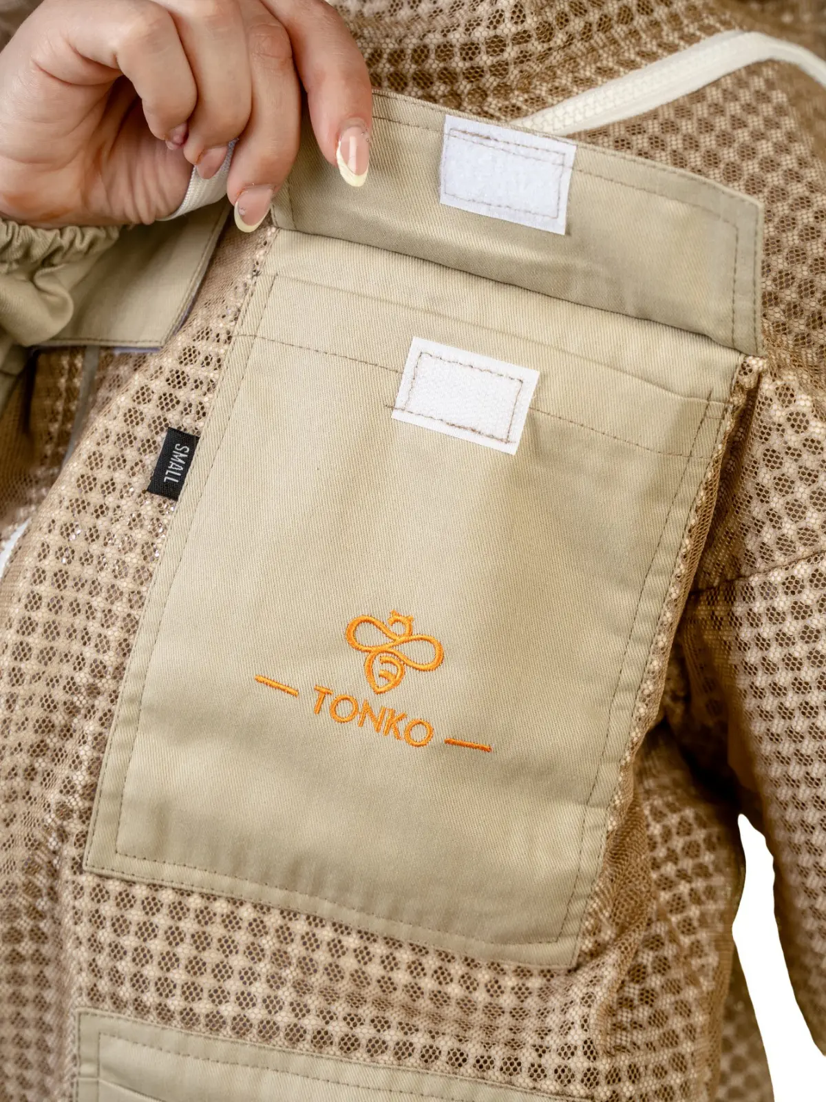 Detail of the pocket and velcro straps on a Tonko suit